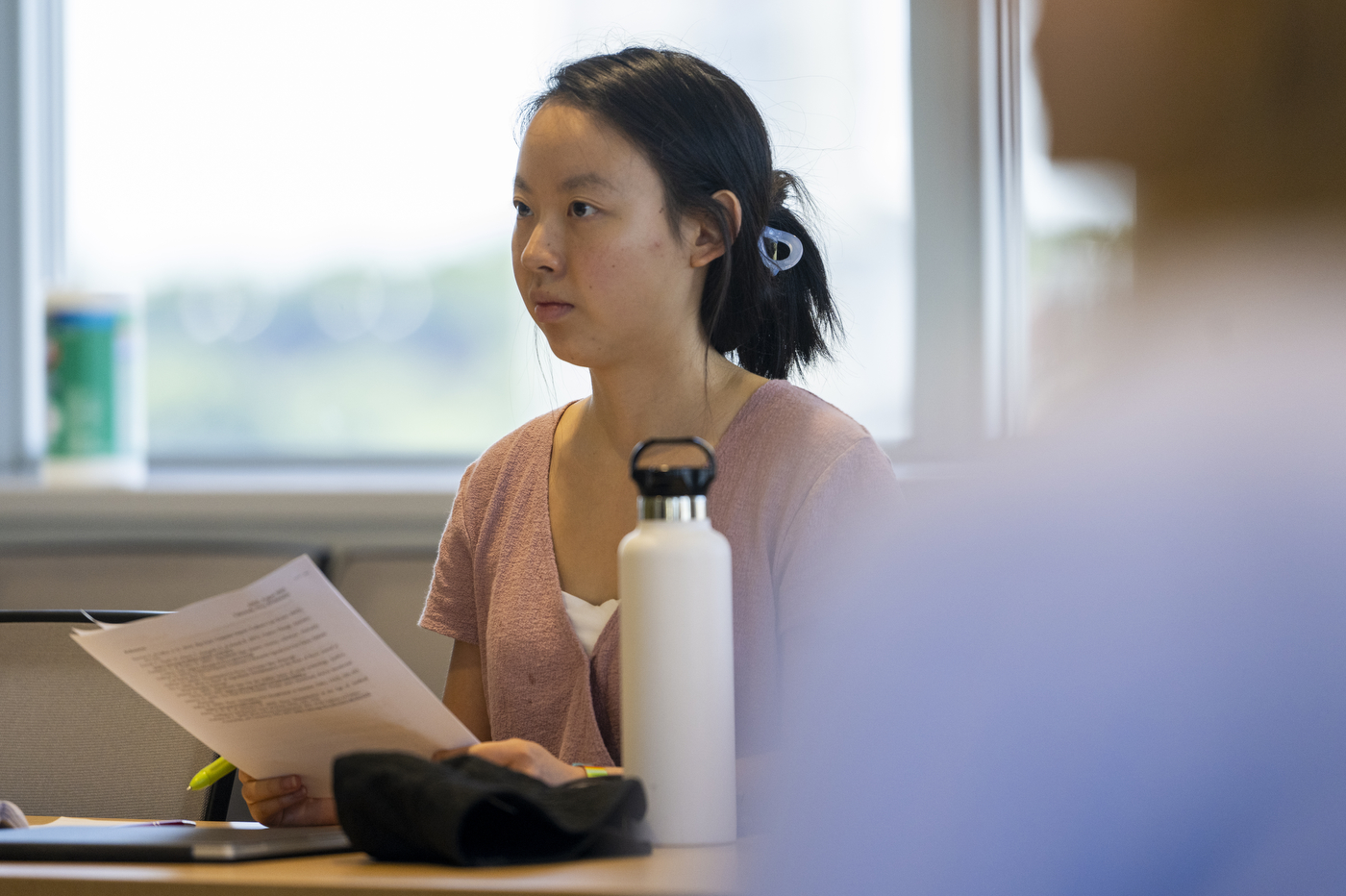 student working in a classroom