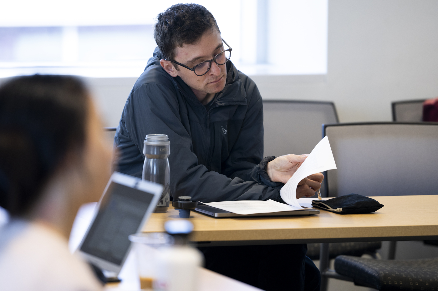 student working in a classroom