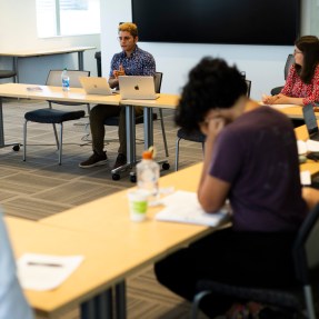 graduate students in a classroom for AI ethics summer program