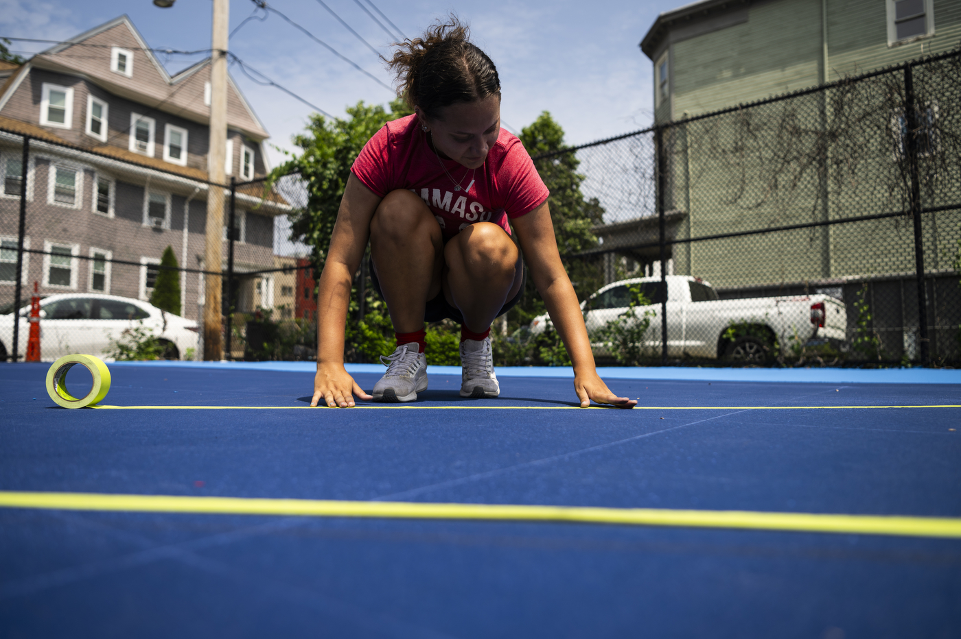 Kaiya Santos laying down tape