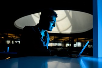 Dr. Avijit Ghosh working on his computer