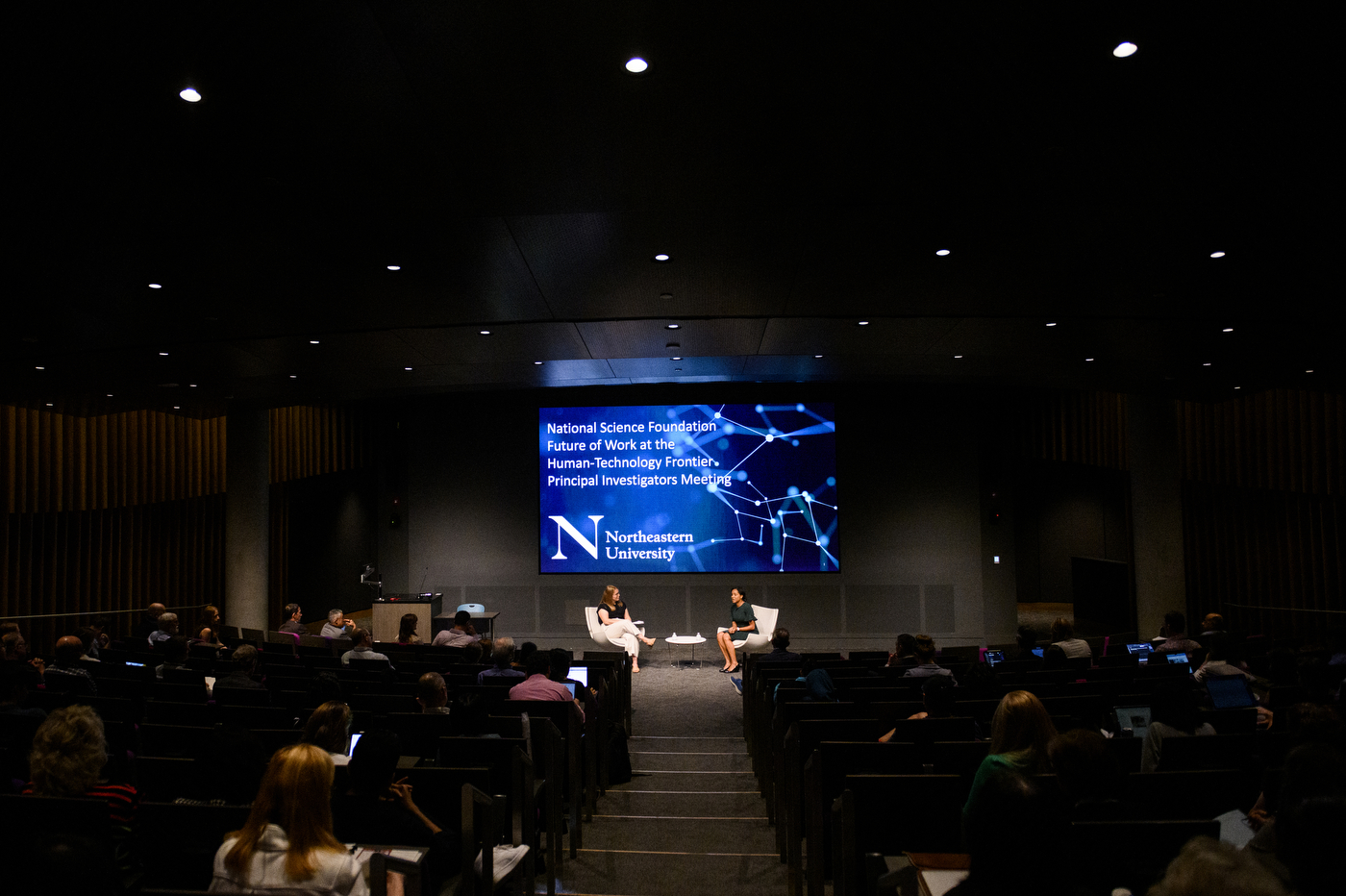 Lauren E. Jones speaking at a fireside chat in ISEC.