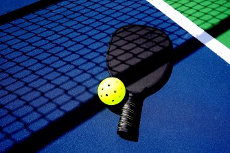 pickle ball paddle on a court