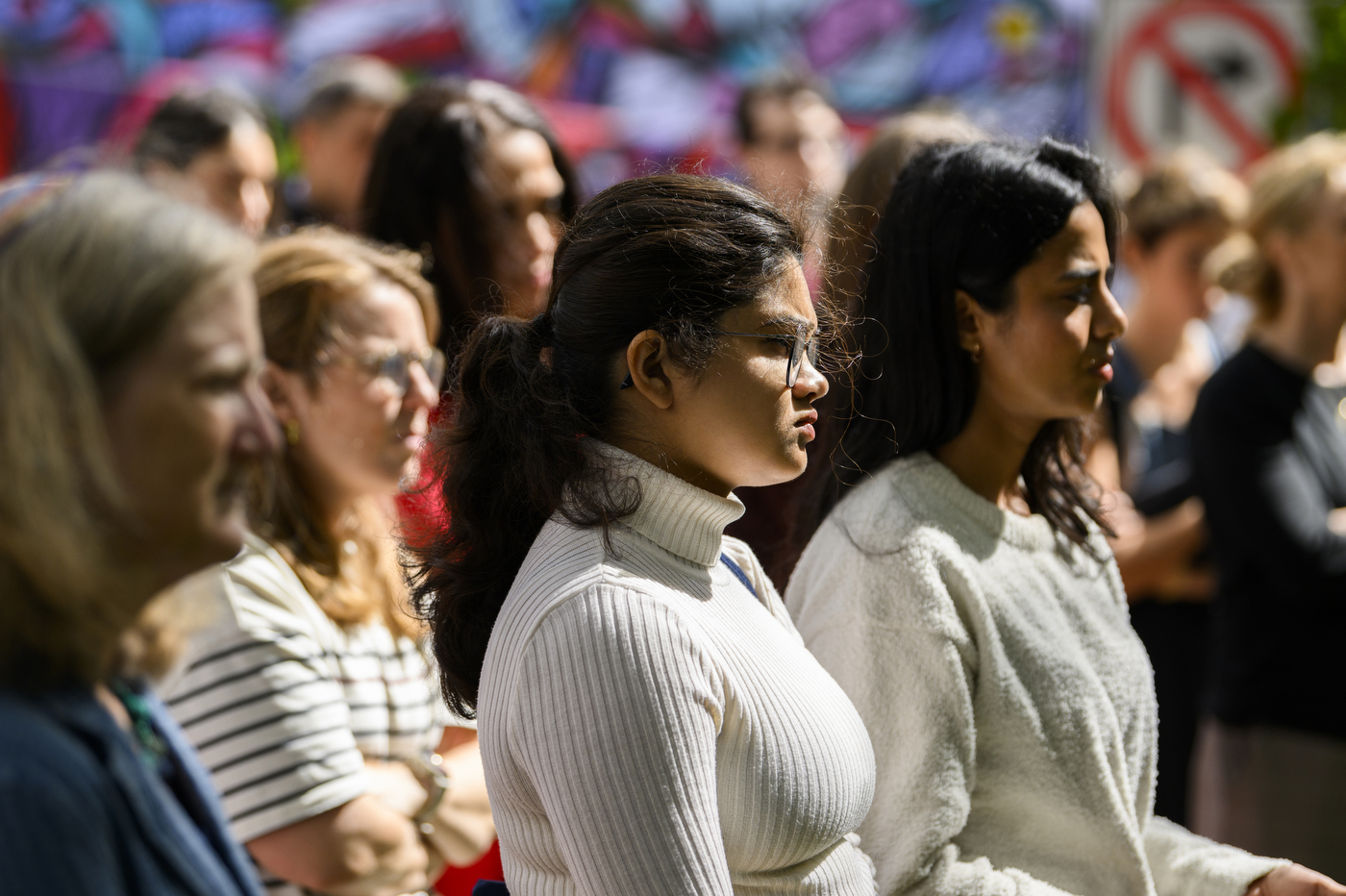 Audience members gathered to honor the memory of Jaahnavi Kandula.