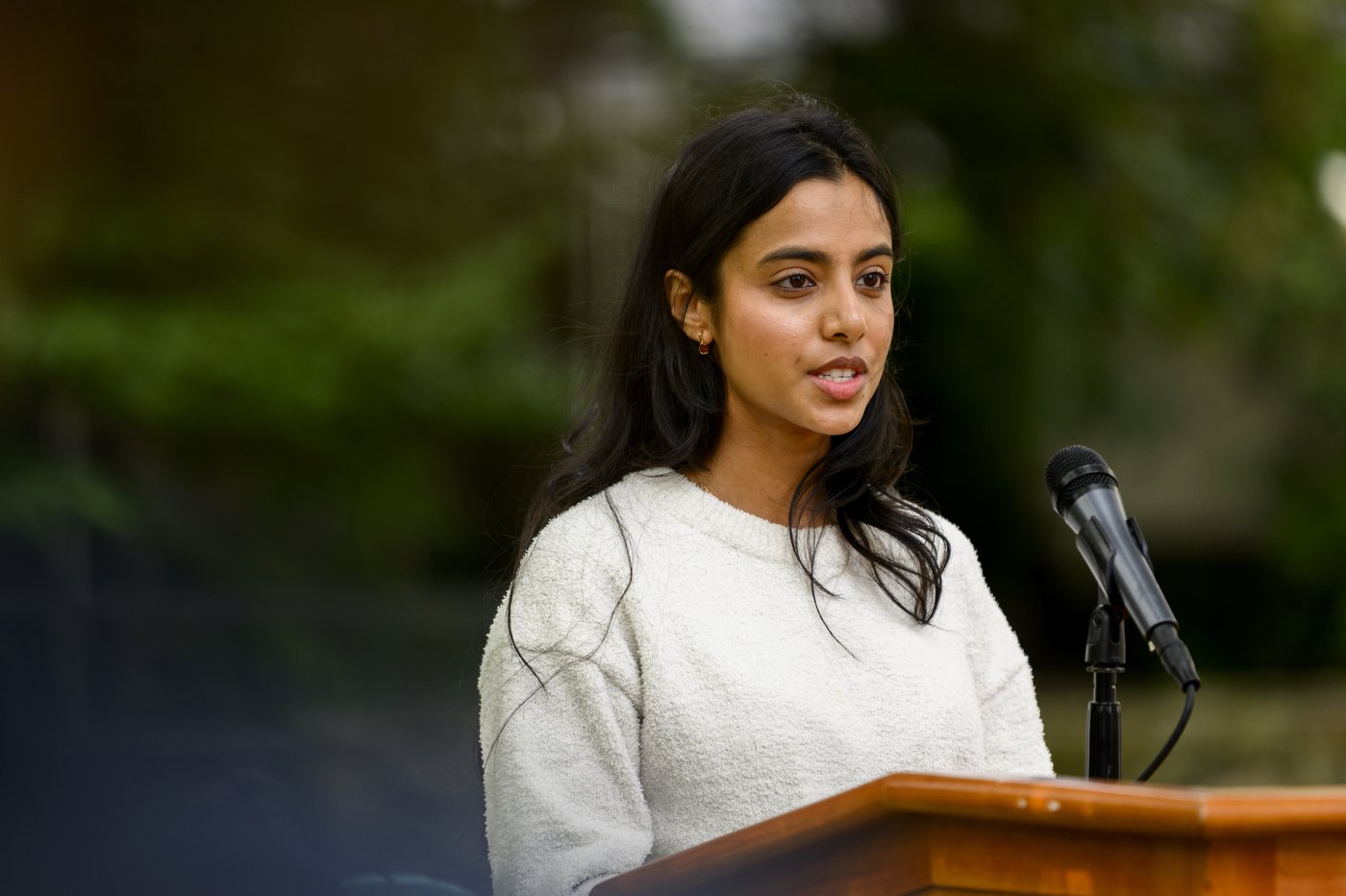 Student speaking to honor the memory of Jaahnavi Kandula.