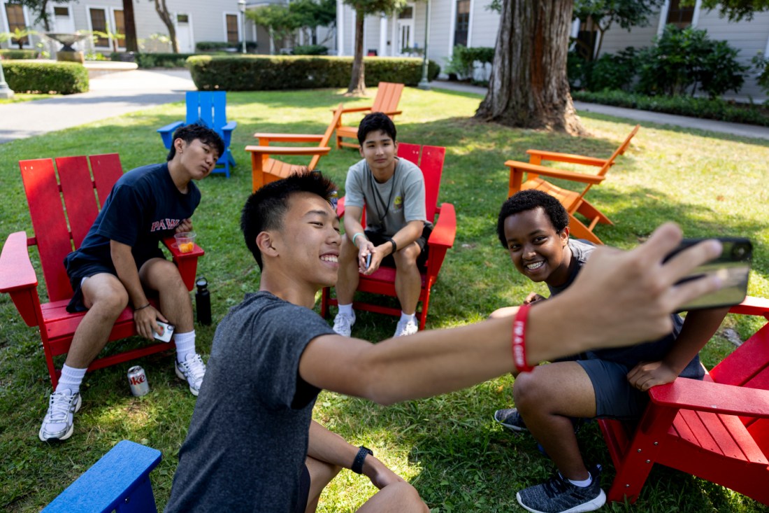 Keaton Wong, Aten Ponchung, Joshua Lee, and Robenus Waktole taking a selfie