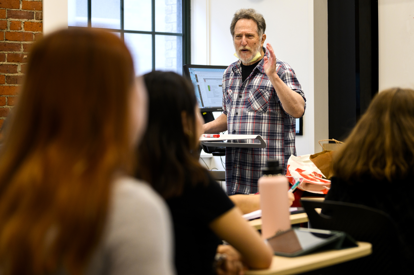 Professor Stanley Eigen teaching Mathematics, Magic, and Puzzles at Hastings Hall.