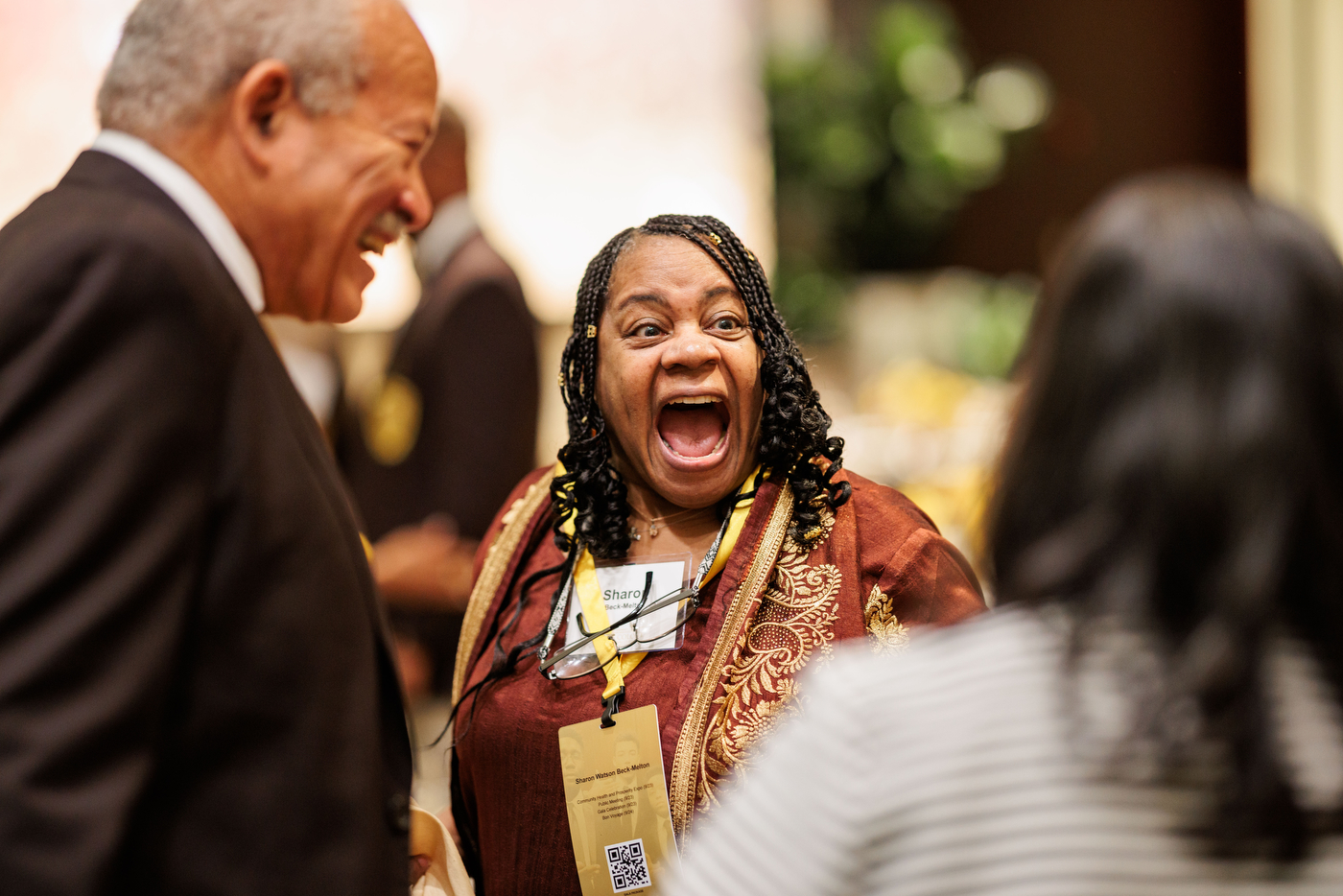 Members of Iota Phi Theta laughing.