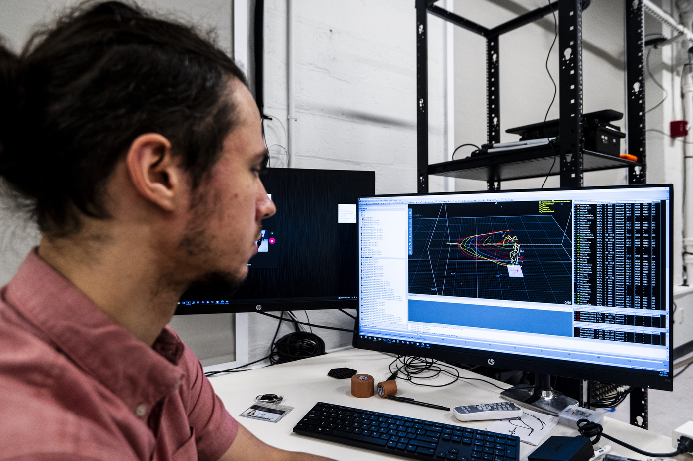 Side profile of Jack Lepiarz sitting in front of a computer.