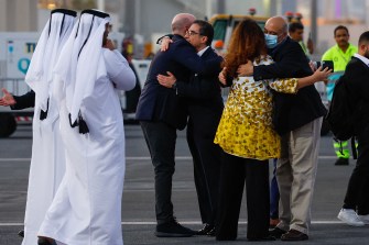 Siamak Namazi and Morad Tahbaz are embraced upon their arrival in Doha.