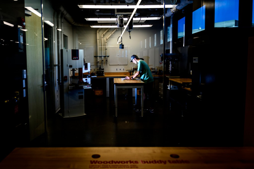 Person working inside the Makerspace in EXP.