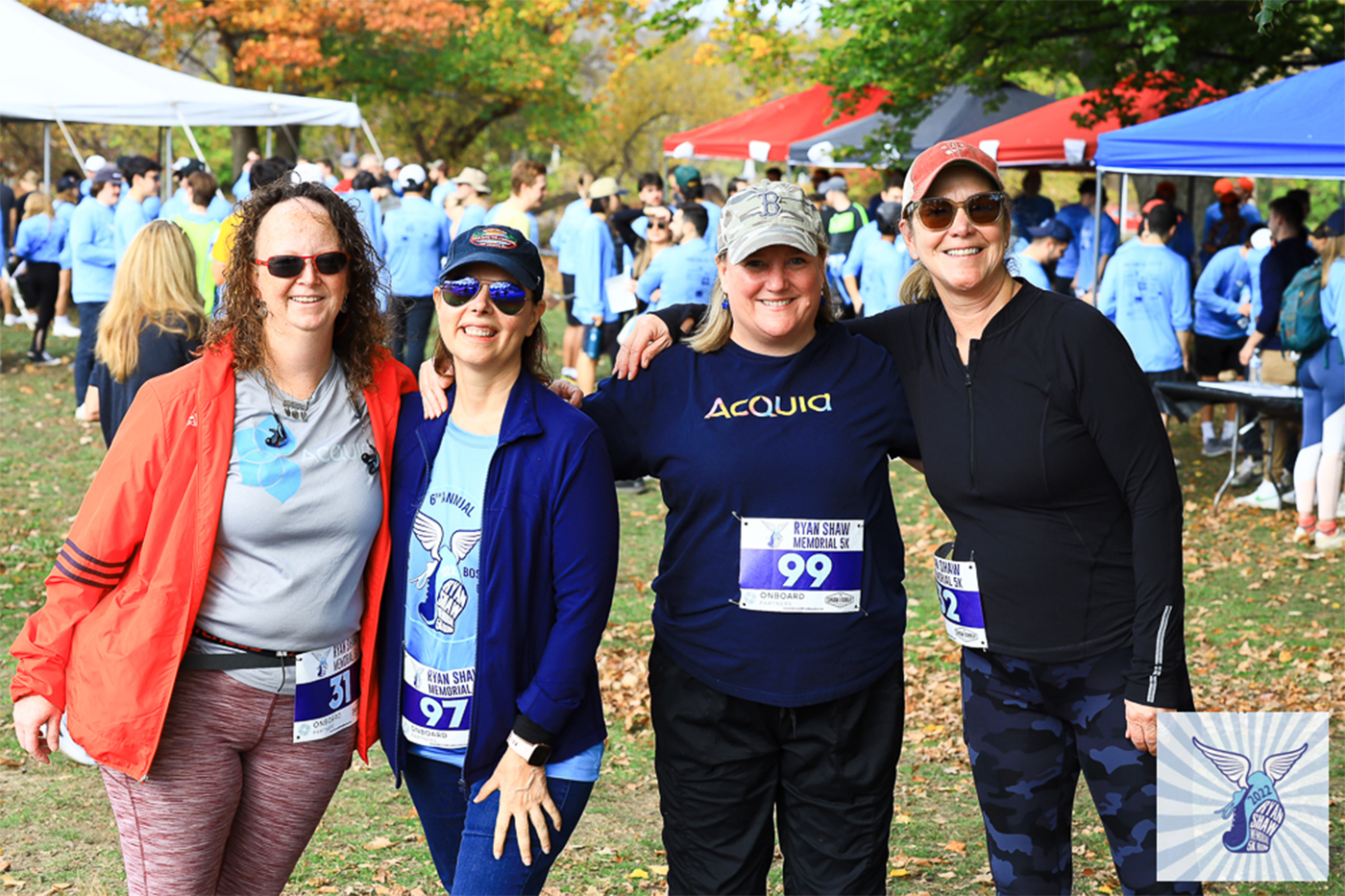 People posing for a group photo at the Ryan Shaw Memorial 5K.