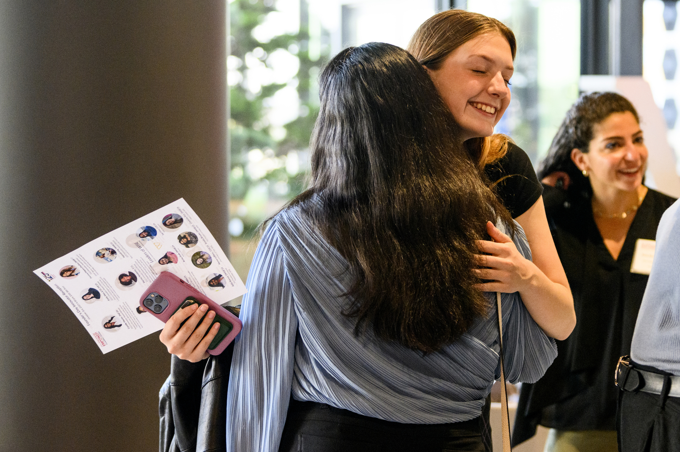 Participants at the event hug