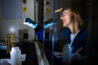 Magda H. Barecka working in a lab.