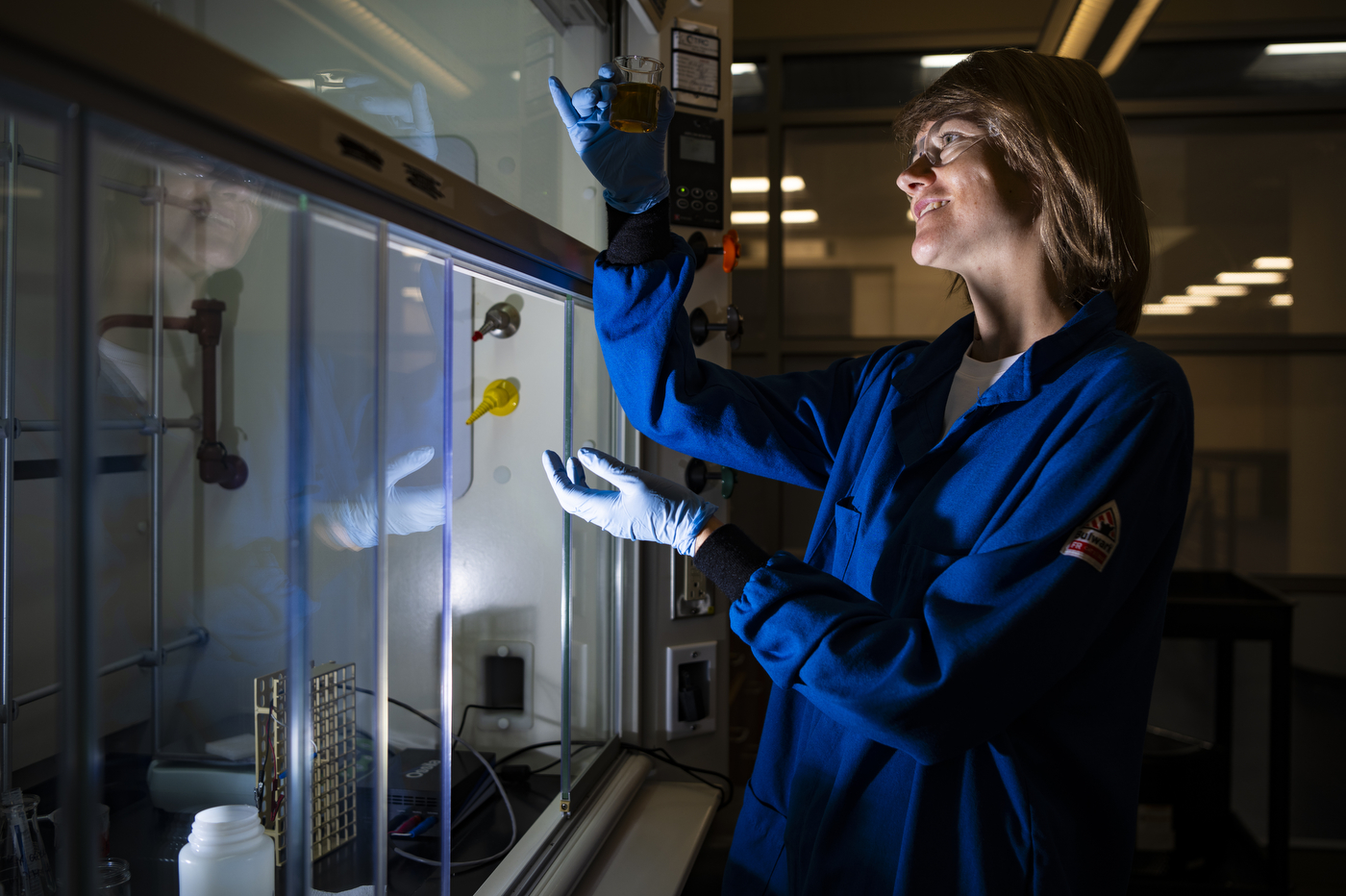 Magda H. Barecka working in a lab.