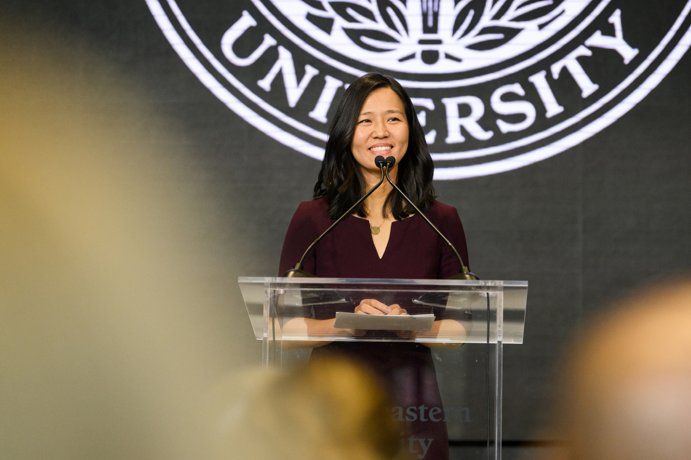 Boston Mayor Michelle Wu talks at the EXP grand opening.