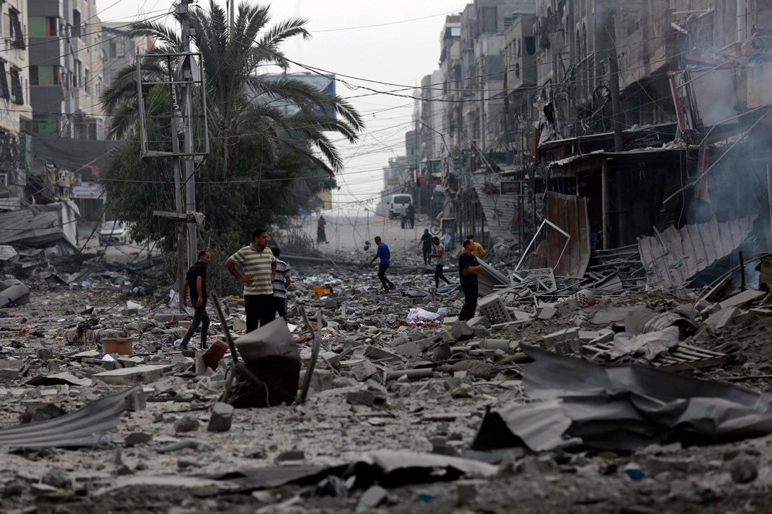 Rubble piled up around buildings after an airstrike in the Israel Hamas war.