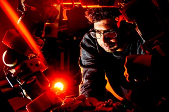 Taskin Padir works on a robot in the new EXP Robotics Lab.