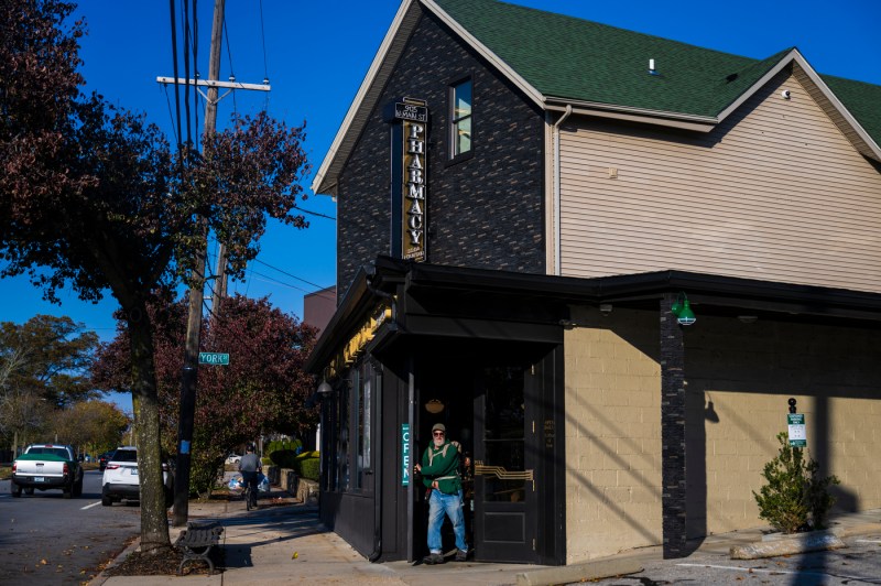 Customer leaving Green Line Apothecary.