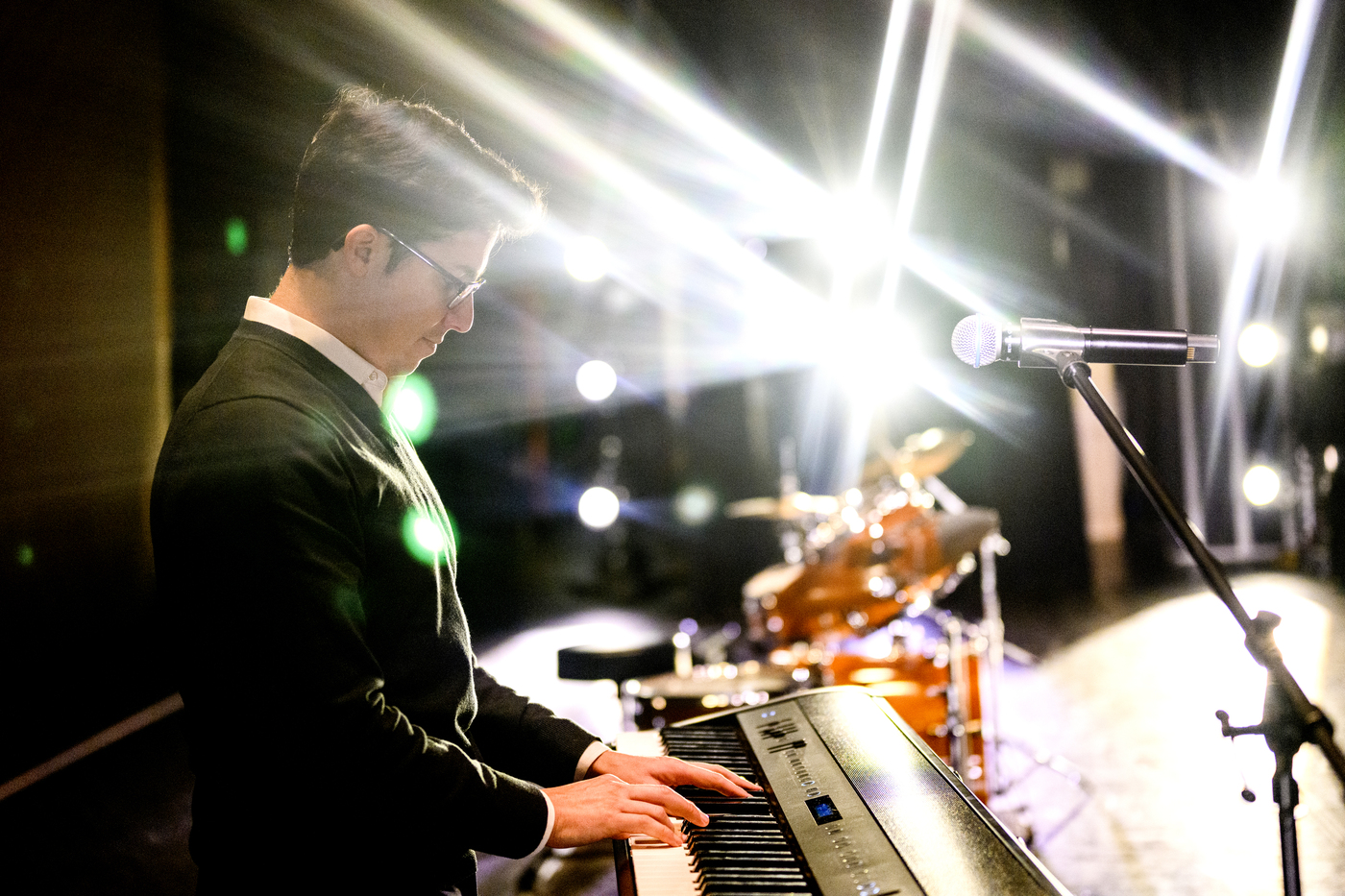 James Gutierrez playing the piano.