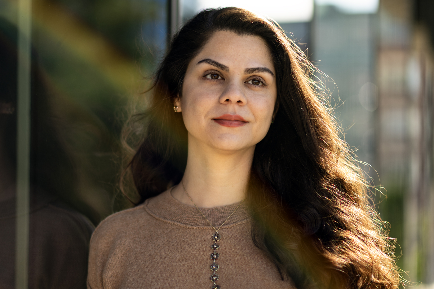 Headshot of Susan Dina Ghiassian.