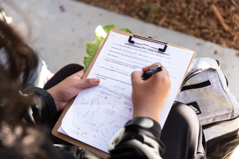 Student working on a worksheet about sustainable urban design. 