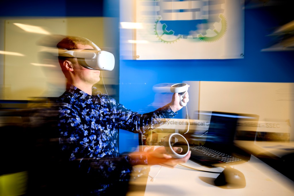 Student using a VR headset for an inclusive engineering project.