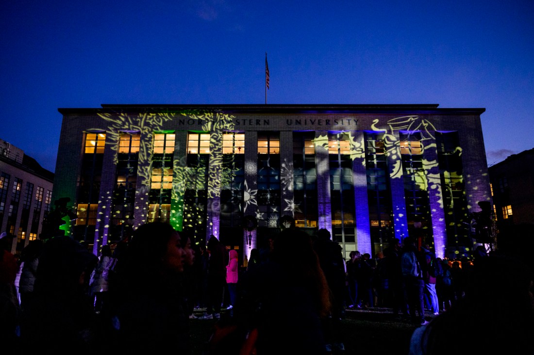 An extensive set of special lighting effects is displayed outside Northeastern's Ell Hall.