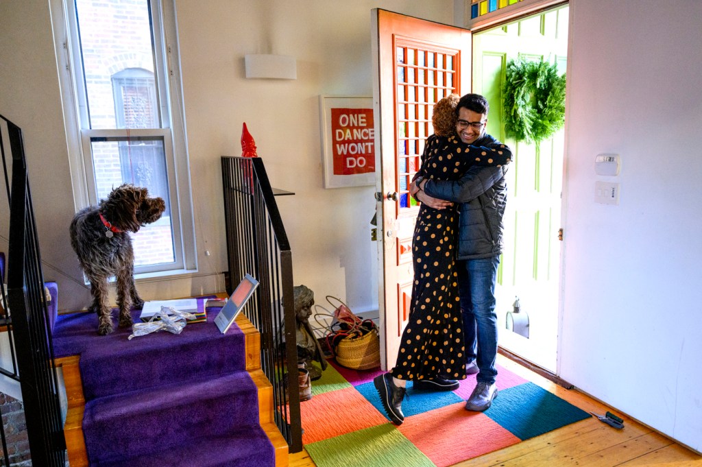 Amy Dablemont Burnes and Harsh Shah hugging.