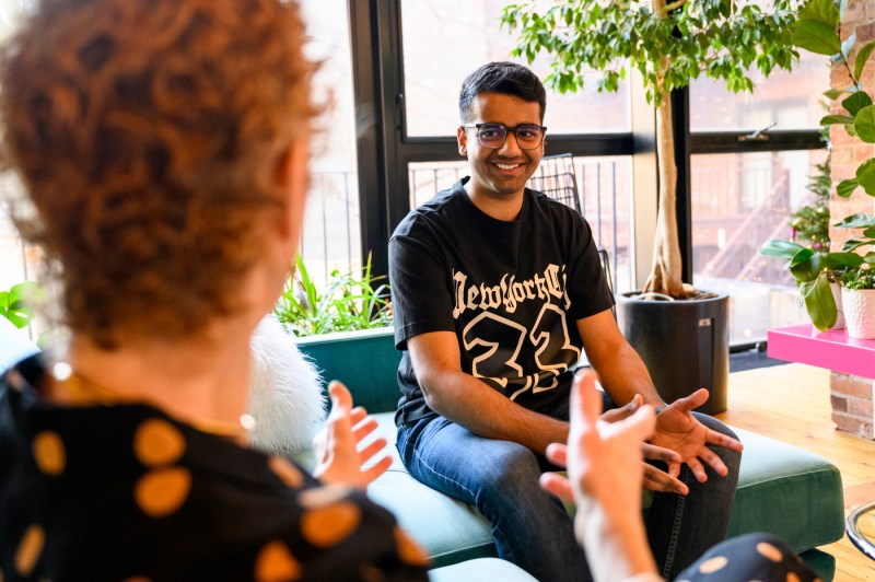 Harsh Shah speaking with Amy Dablemont Burnes.