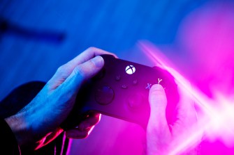 Person using an X-box controller.