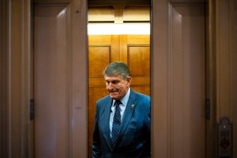 Senator Joe Manchin in an elevator.