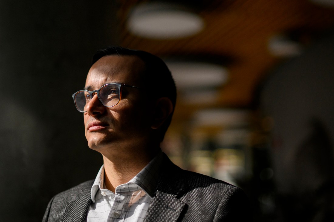 Headshot of a Northeastern community member wearing glasses. 