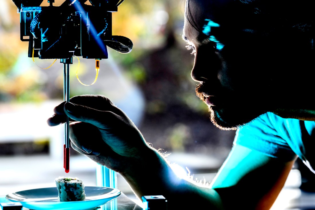 Person using lab equipment.