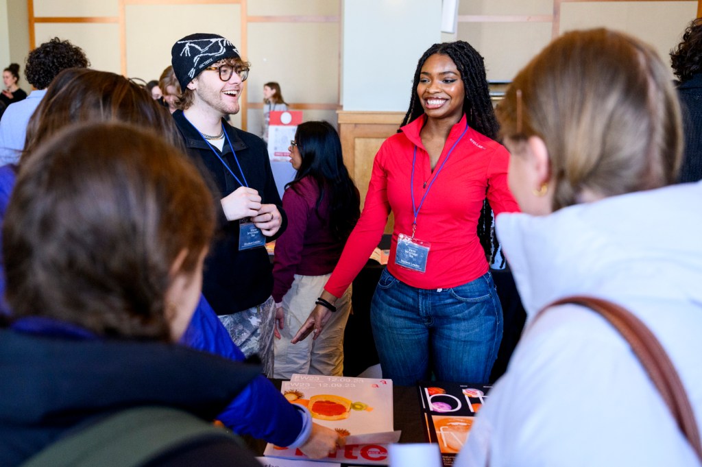 Students discussing clubs at the Winter Involvement Fair 2024.