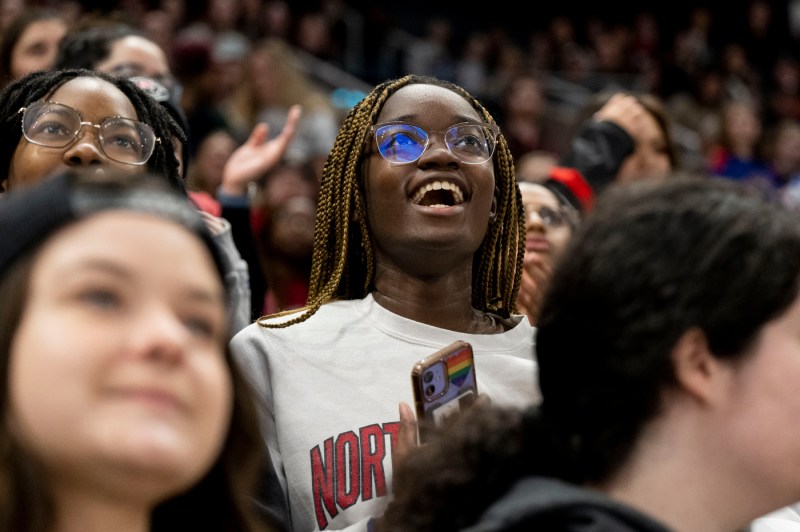 Member of the crowd smiling at TD Garden.