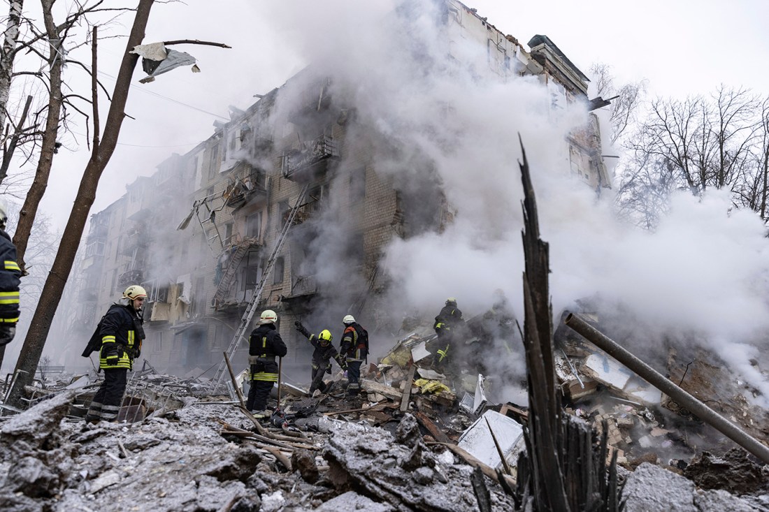 Smoke billowing from an apartment building in Ukraine that had been hit by a Russian missile.