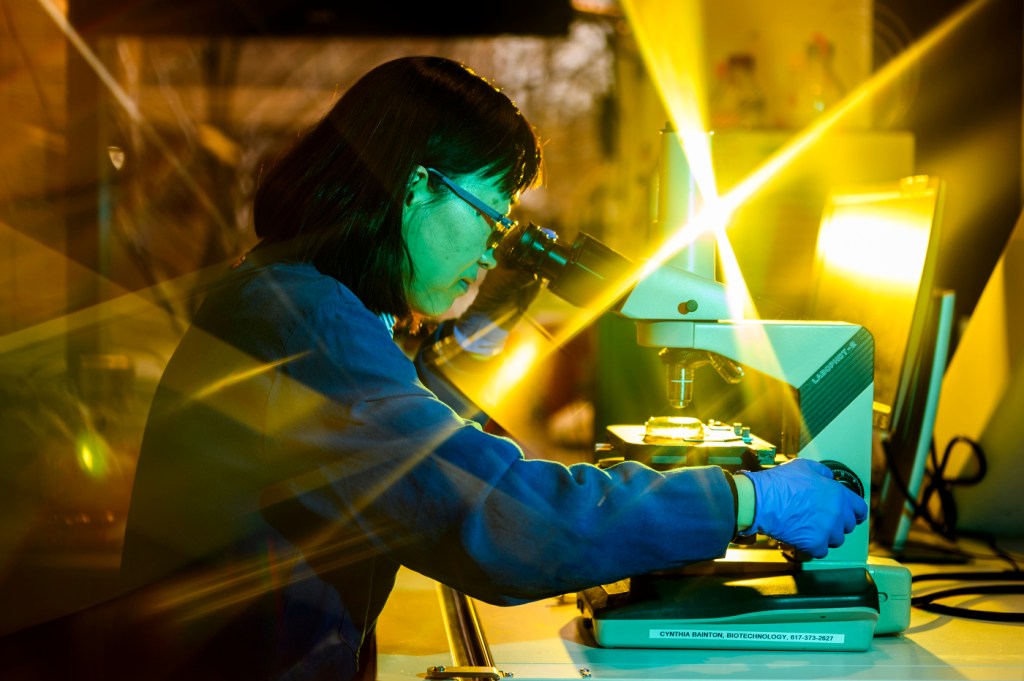 Wei Xie working in a lab.