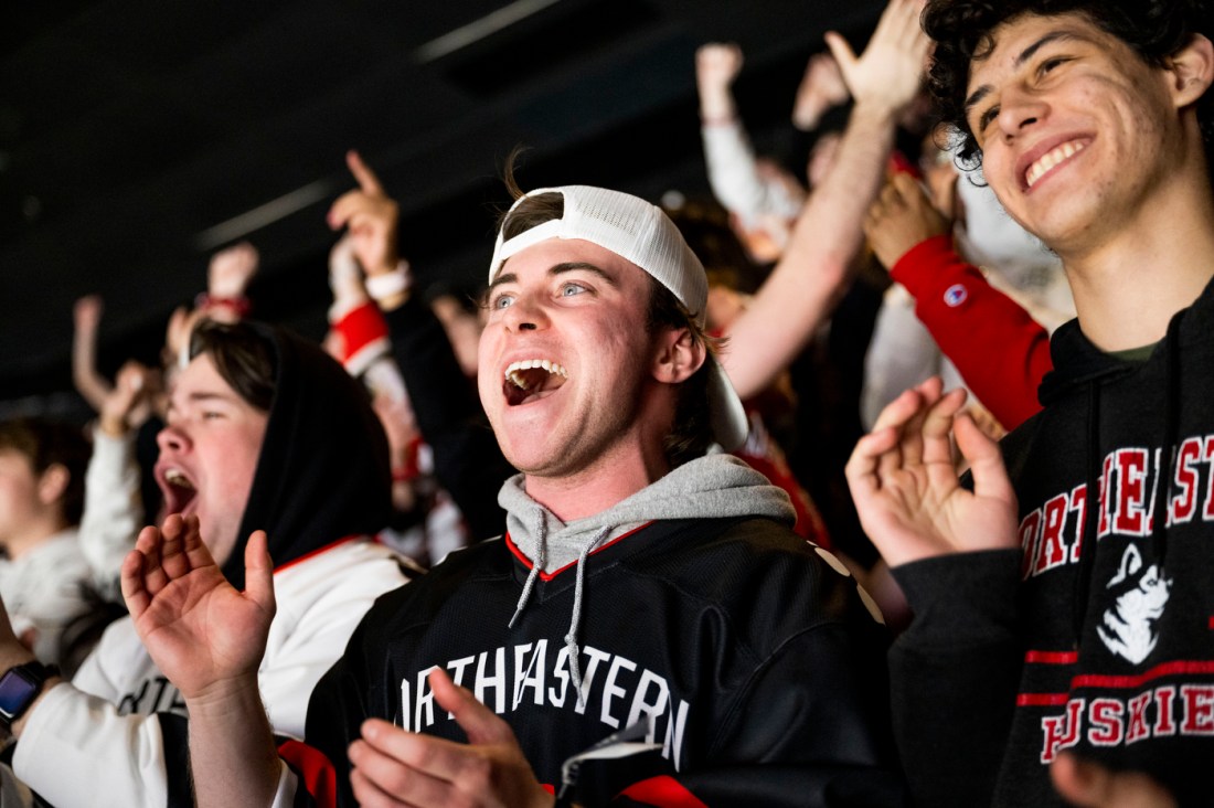 Students cheering on the Huskies.