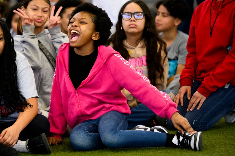 Kids laughing and smiling.