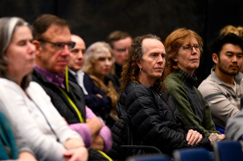 Audience members listening to Marty Baron.