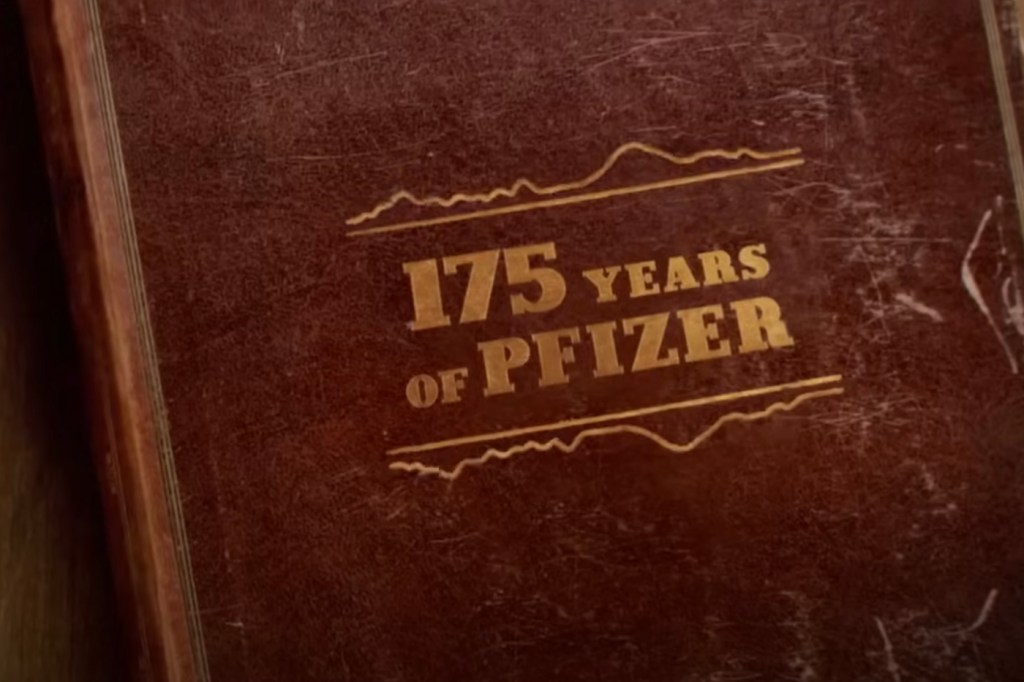 A brown book with golden-colored text: "175 years of Pfizer."