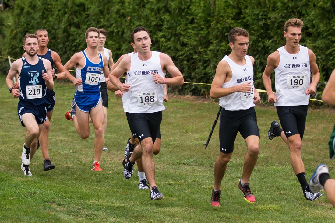 Michael Duggan running in a race on Northeastern's track team.