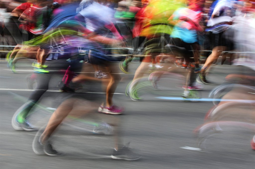 Time lapse photo of runners in the New York Marathon.