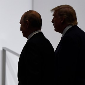 Silhouette of President Donald Trump and Russian President Vladimir Putin standing next to each other.