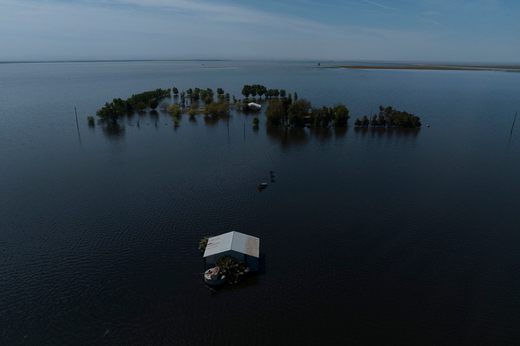 Farmland partially submerged in Tulare Lake Basin.