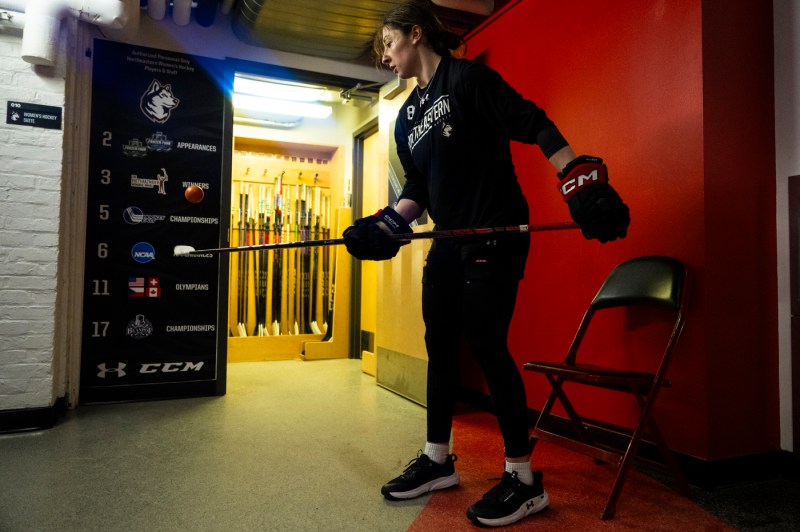 Womens hockey player warming up. 