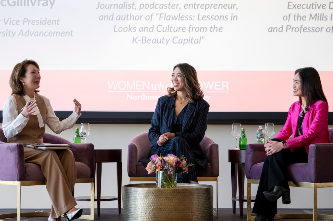 Diane Nishigaya MacGillivray speaking with Elise Hu at Women Who Empower event. 