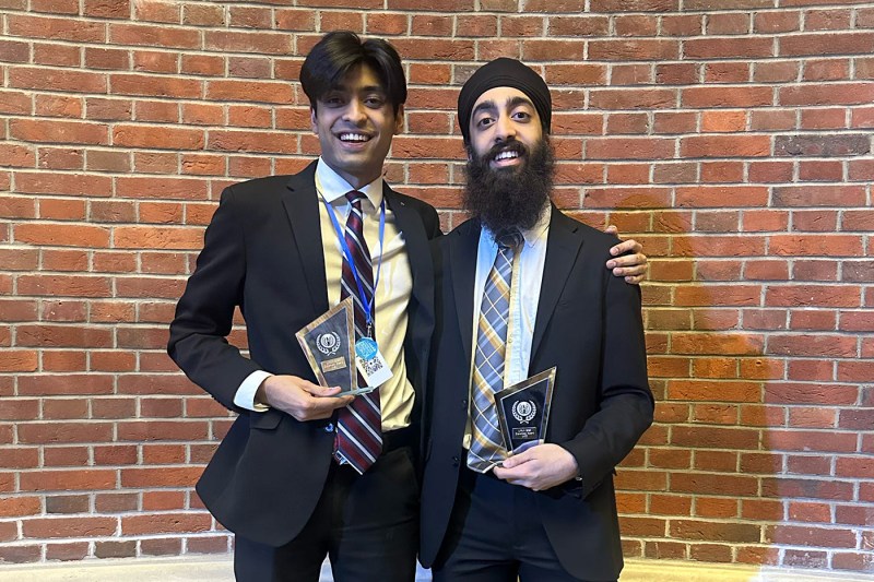 Students in the International Relations Council posing with awards.