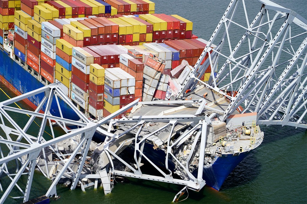 A large cargo ship crashes into the Baltimore bridge.